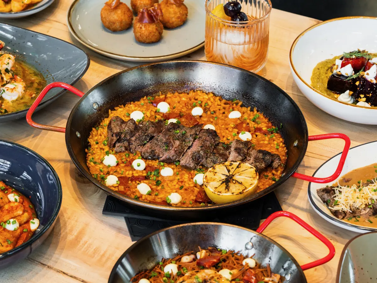 Paella with bomba rice, Spanish chorizo and grilled steak