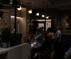 full dining room at nigh 