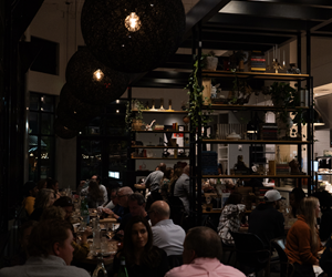 full dining room at nigh 
