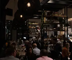 full dining room at nigh 