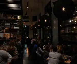 full dining room at nigh 